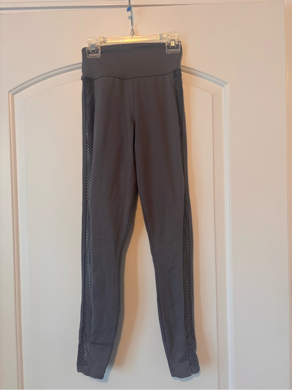 These are NUX Women's Bombshell Sportswear Pro Seamless leggings in dark grey